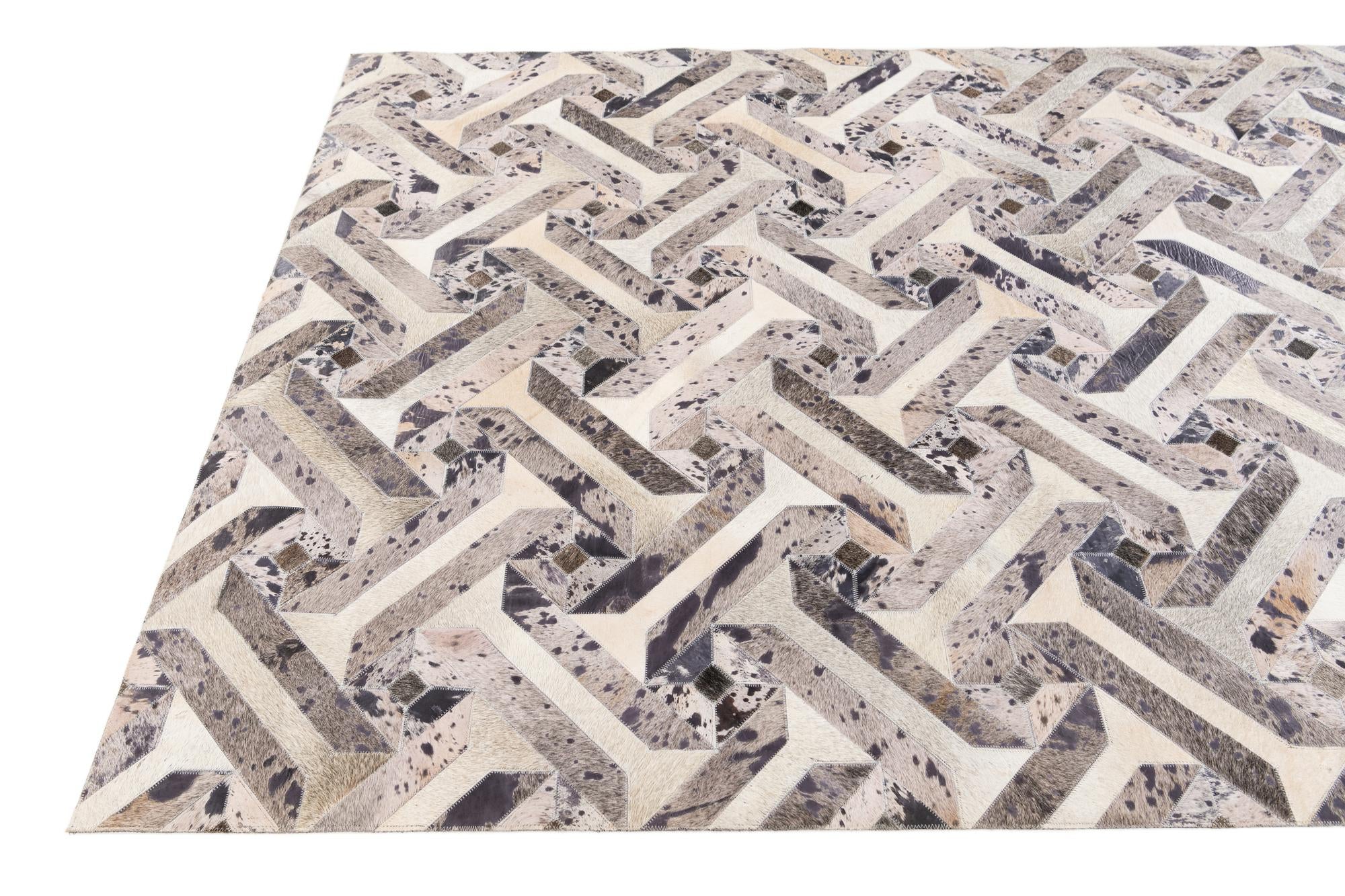 5' 2 x 8' 1 Cowhide Stocks Rug