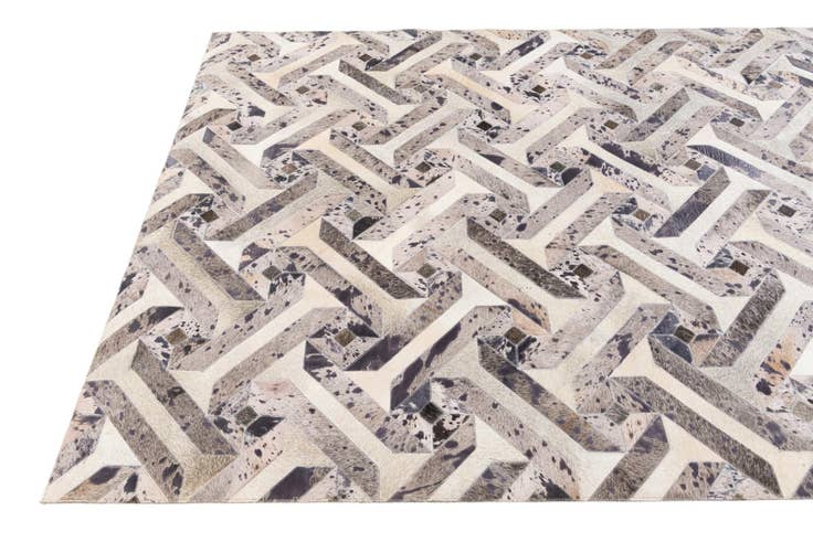 Detail image of 5' 2 x 8' 1 Cowhide Stocks Rug
