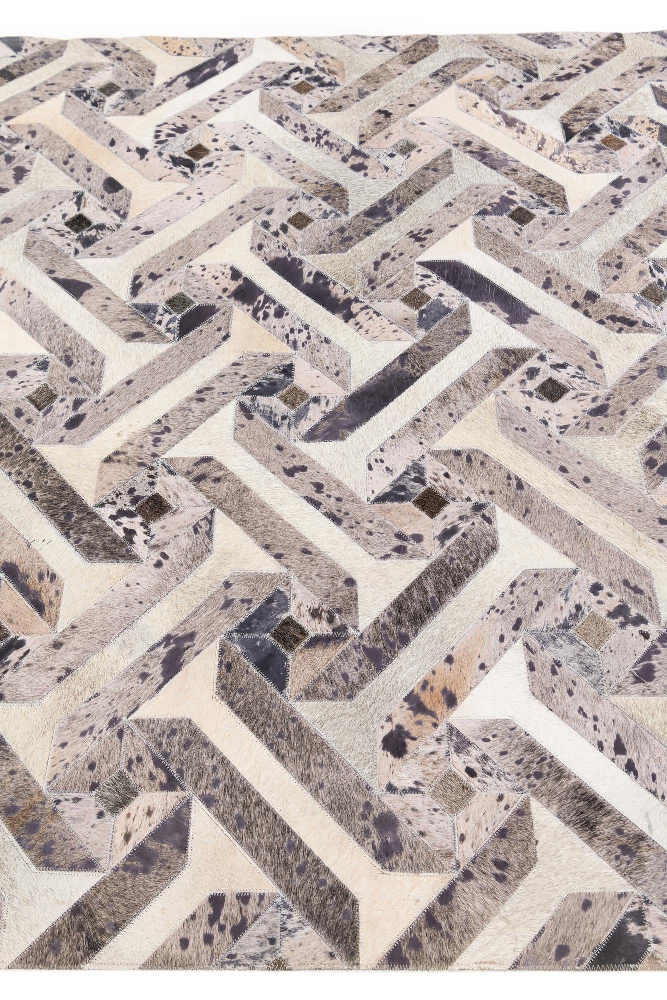 5' 2 x 8' 1 Cowhide Stocks Rug