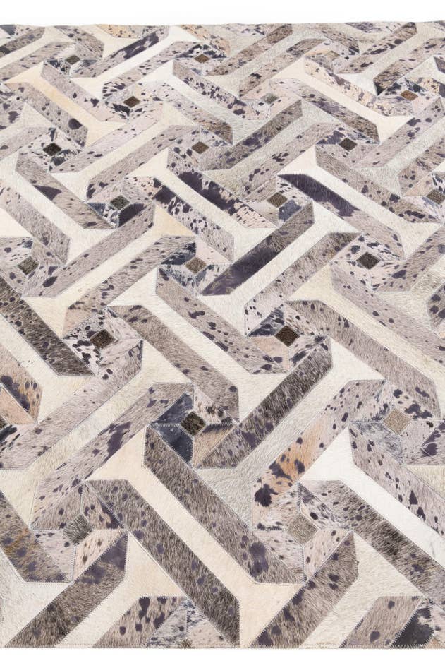 Detail image of 5' 2 x 8' 1 Cowhide Stocks Rug