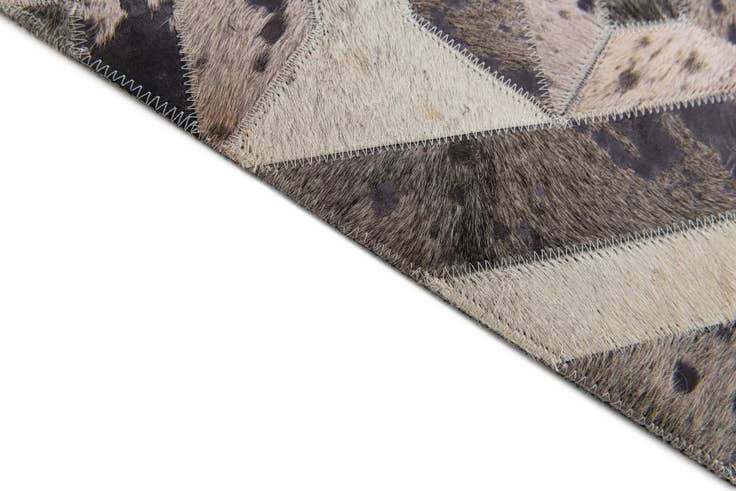 Detail image of 5' 2 x 8' 1 Cowhide Stocks Rug