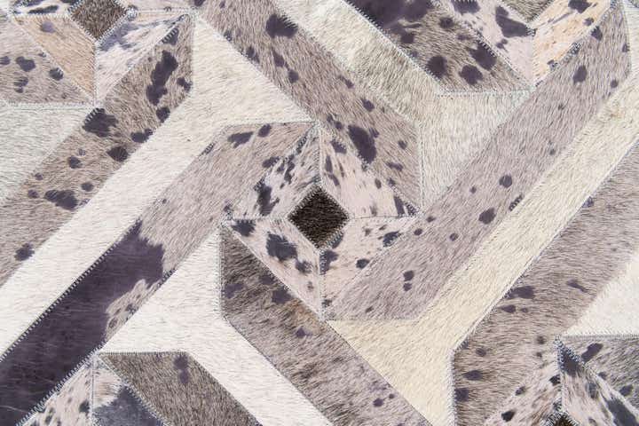 5' 2 x 8' 1 Cowhide Stocks Rug