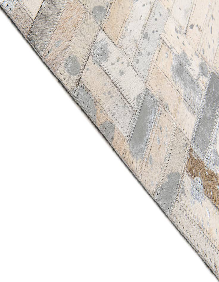 Detail image of 4' 11 x 8' 1 Cowhide Stocks Rug