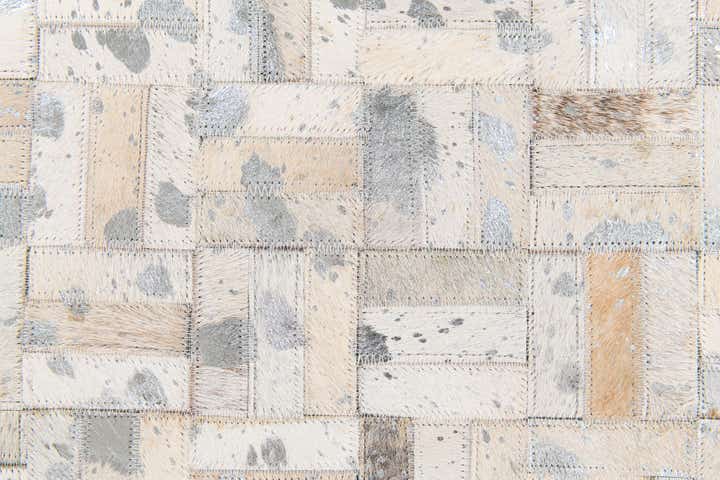 4' 11 x 8' 1 Cowhide Stocks Rug