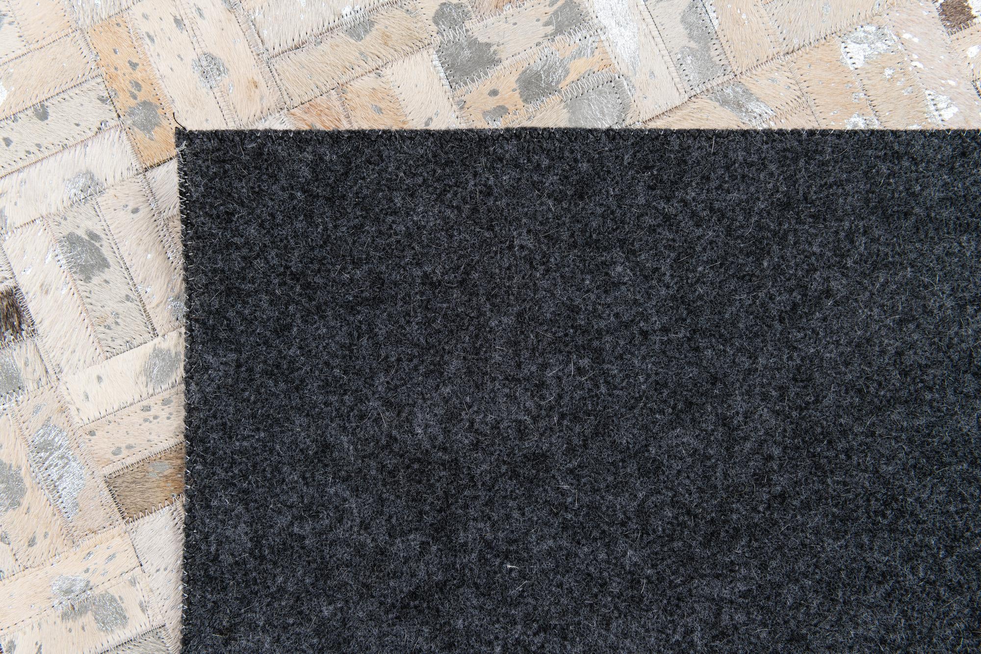4' 11 x 8' 1 Cowhide Stocks Rug
