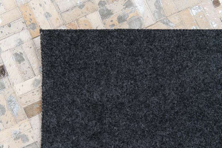4' 11 x 8' 1 Cowhide Stocks Rug