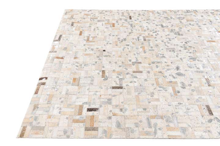 4' 11 x 8' 1 Cowhide Stocks Rug