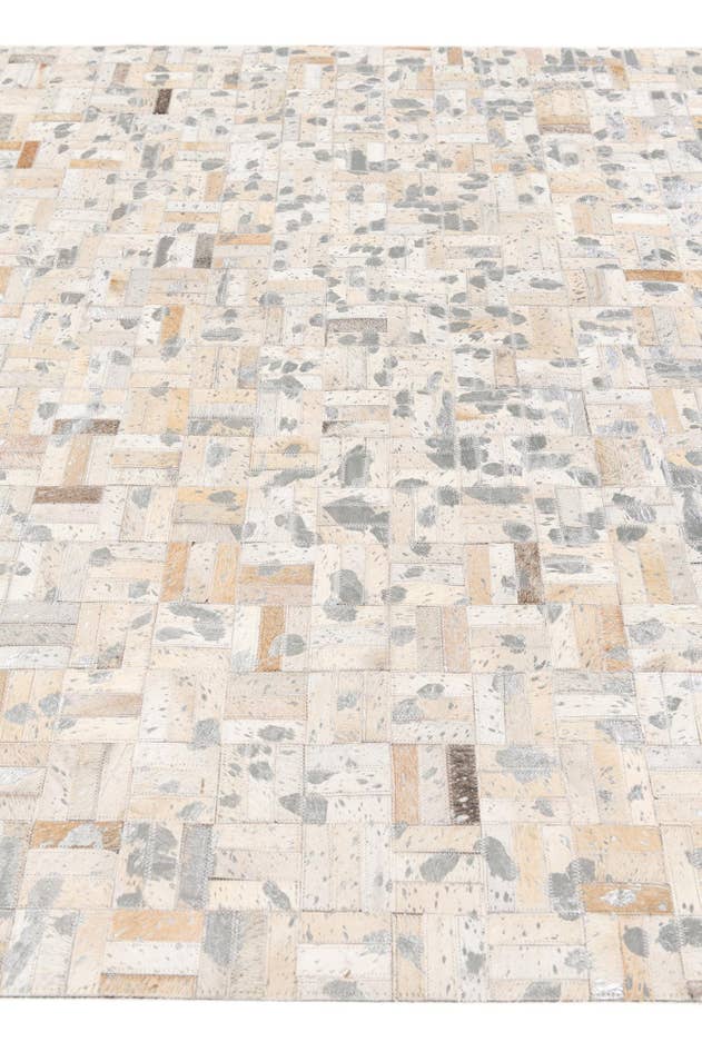 Detail image of 4' 11 x 8' 1 Cowhide Stocks Rug