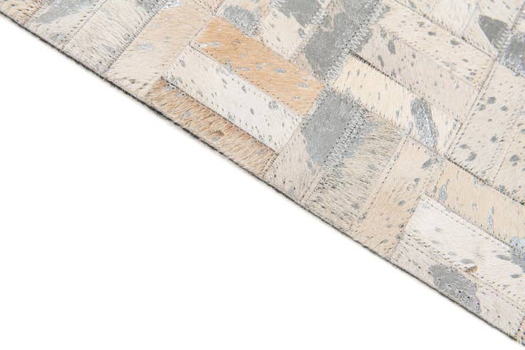 Detail image of 4' 11 x 8' 1 Cowhide Stocks Rug