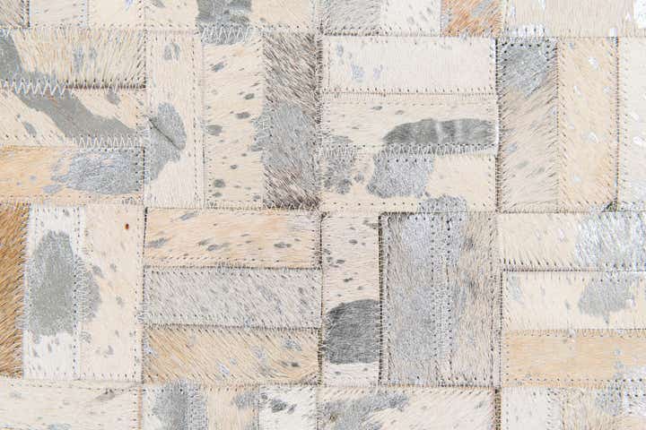 4' 11 x 8' 1 Cowhide Stocks Rug