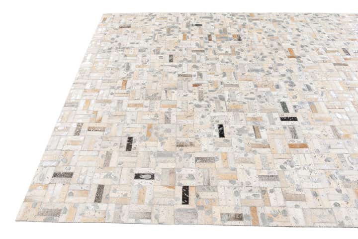 4' 11 x 8' 1 Cowhide Stocks Rug