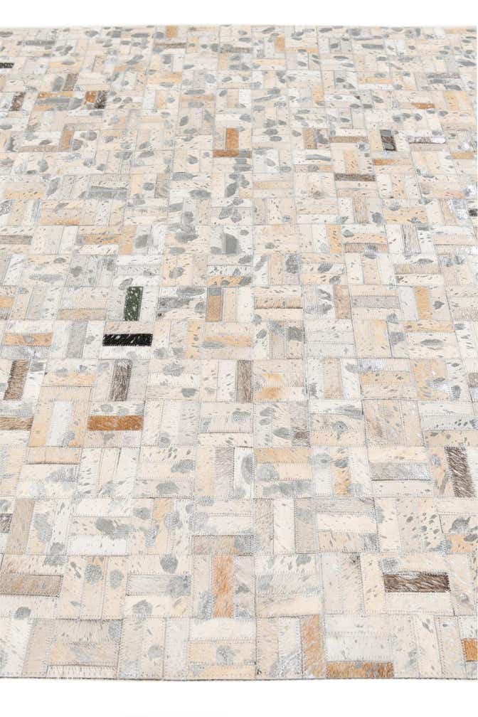 4' 11 x 8' 1 Cowhide Stocks Rug