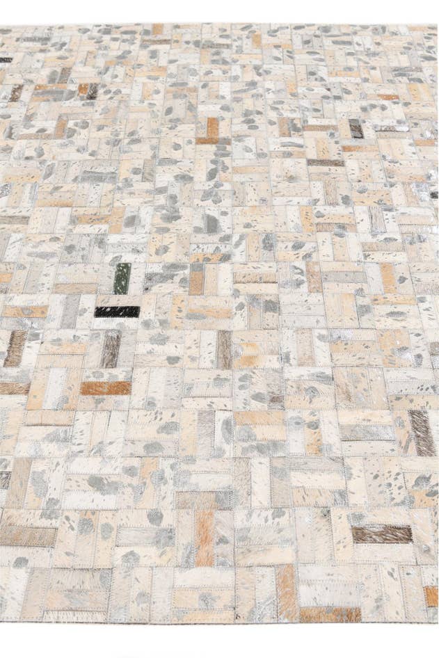 Detail image of 4' 11 x 8' 1 Cowhide Stocks Rug