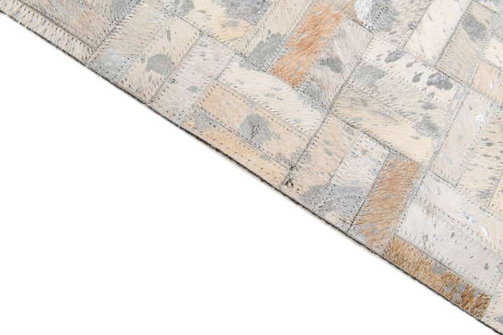 4' 11 x 8' 1 Cowhide Stocks Rug