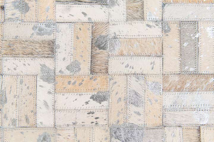 4' 11 x 8' 1 Cowhide Stocks Rug