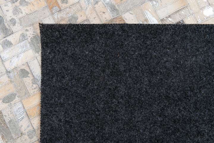 4' 11 x 8' 1 Cowhide Stocks Rug