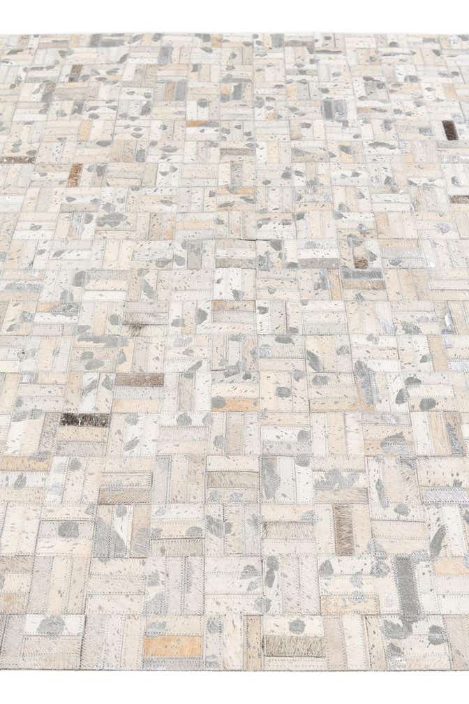 4' 11 x 8' 1 Cowhide Stocks Rug