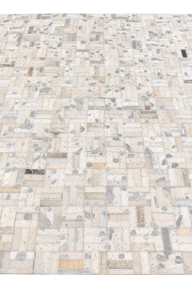 Detail image of 4' 11 x 8' 1 Cowhide Stocks Rug