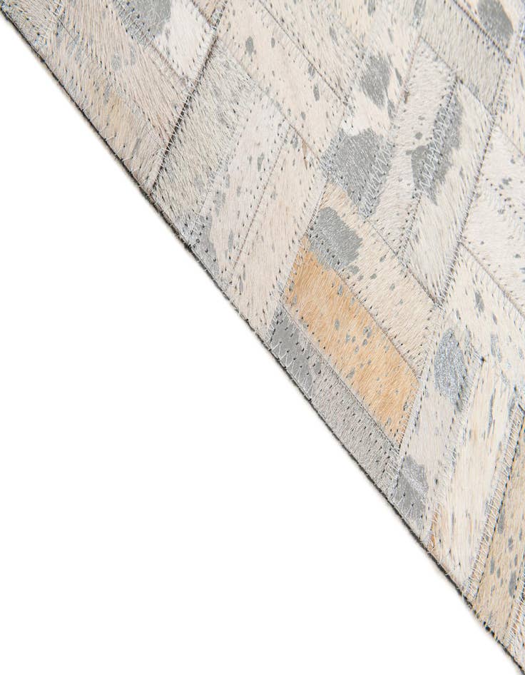 Detail image of 4' 11 x 8' 1 Cowhide Stocks Rug