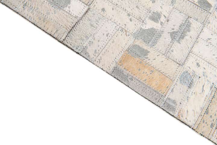 4' 11 x 8' 1 Cowhide Stocks Rug