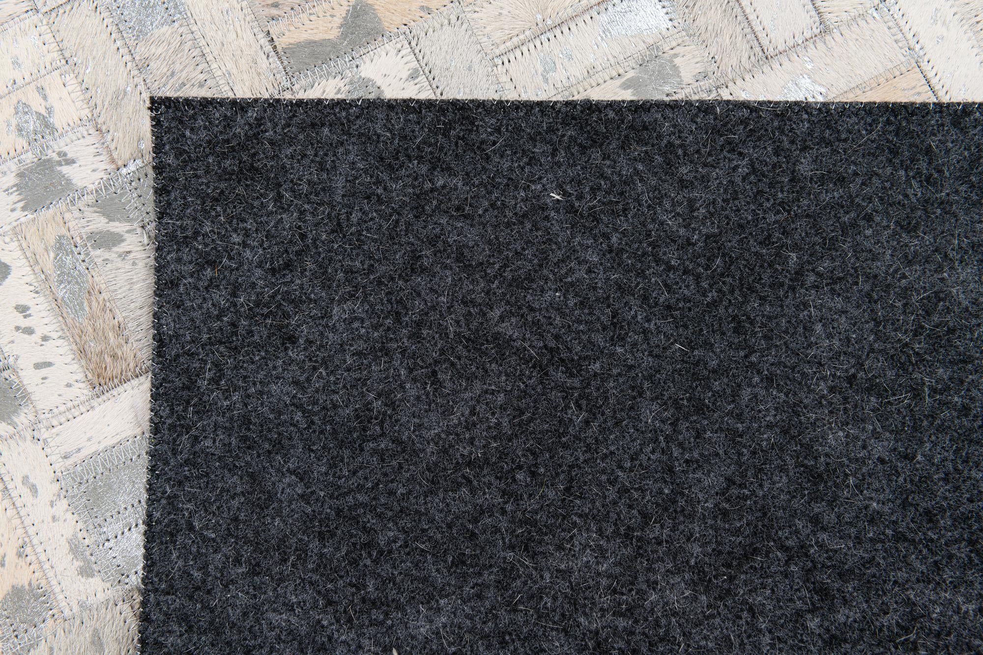 4' 11 x 8' 1 Cowhide Stocks Rug