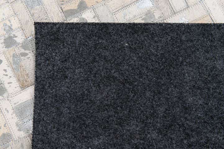 4' 11 x 8' 1 Cowhide Stocks Rug