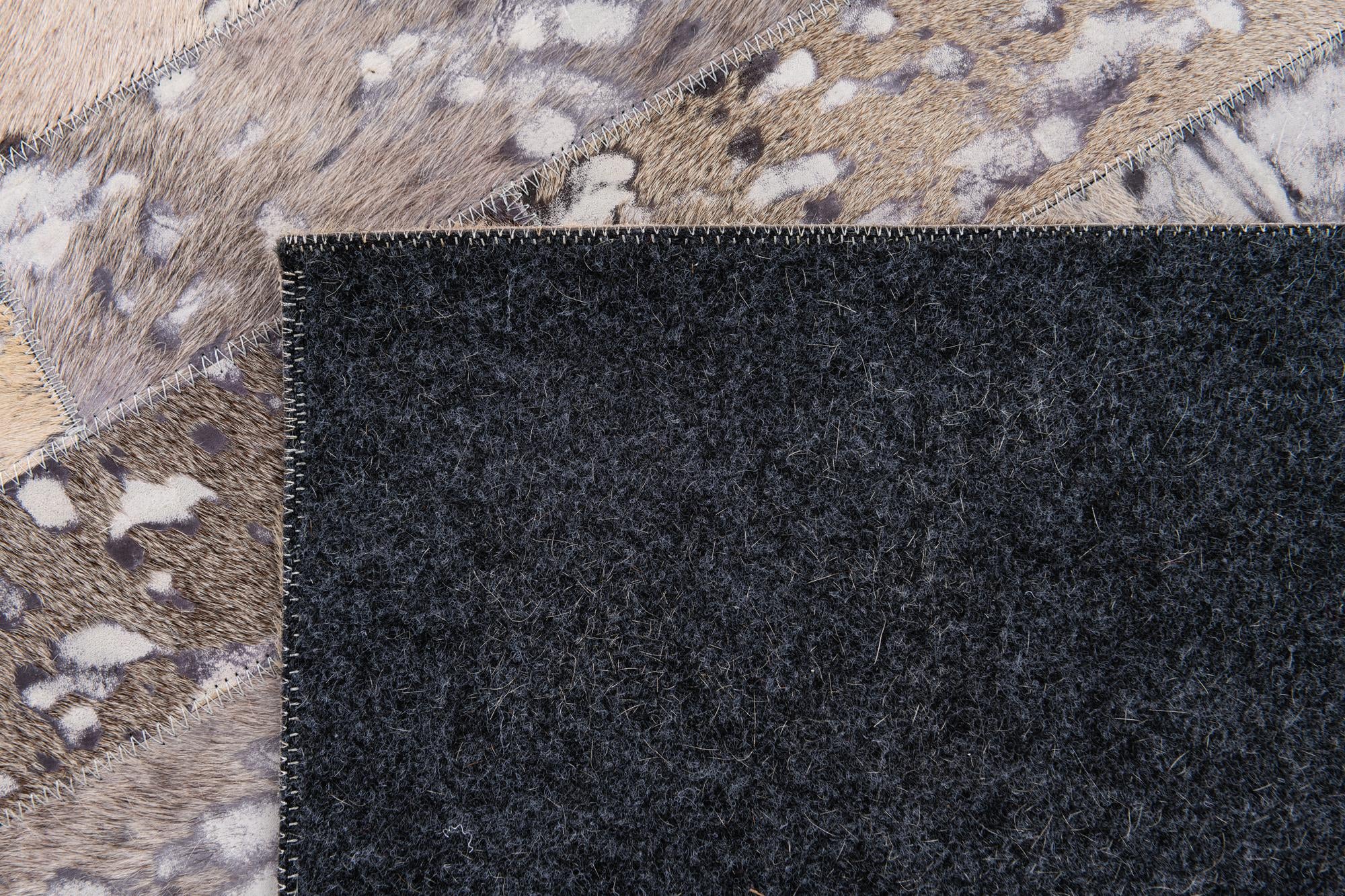 5' 1 x 8' Cowhide Stocks Rug