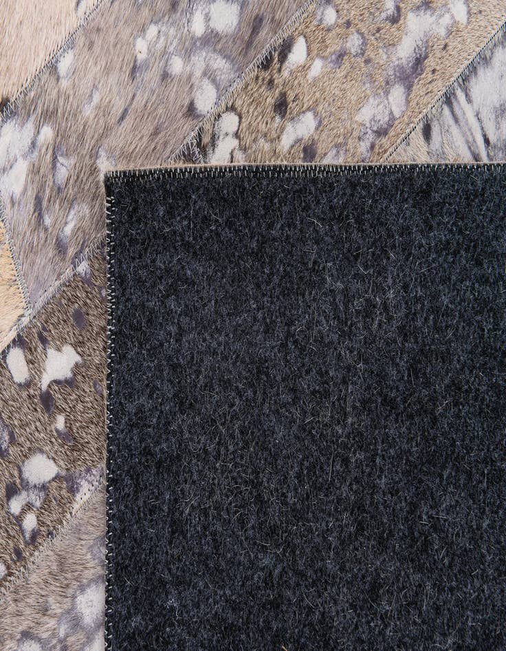 Detail image of 5' 1 x 8' Cowhide Stocks Rug