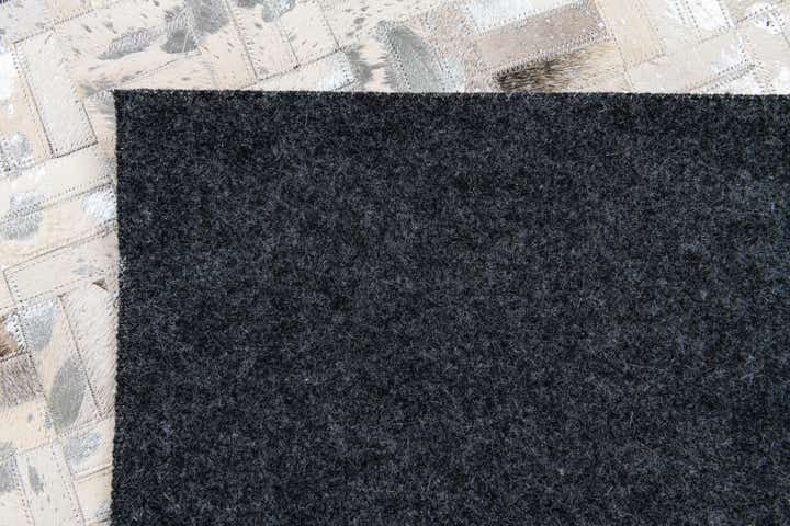 4' 11 x 7' 10 Cowhide Stocks Rug