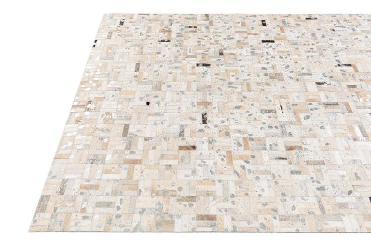 Detail image of 4' 11 x 8' 1 Cowhide Stocks Rug