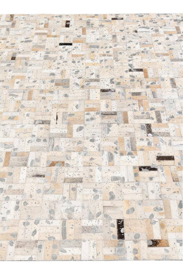 Detail image of 4' 11 x 8' 1 Cowhide Stocks Rug