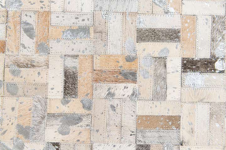 4' 11 x 8' 1 Cowhide Stocks Rug