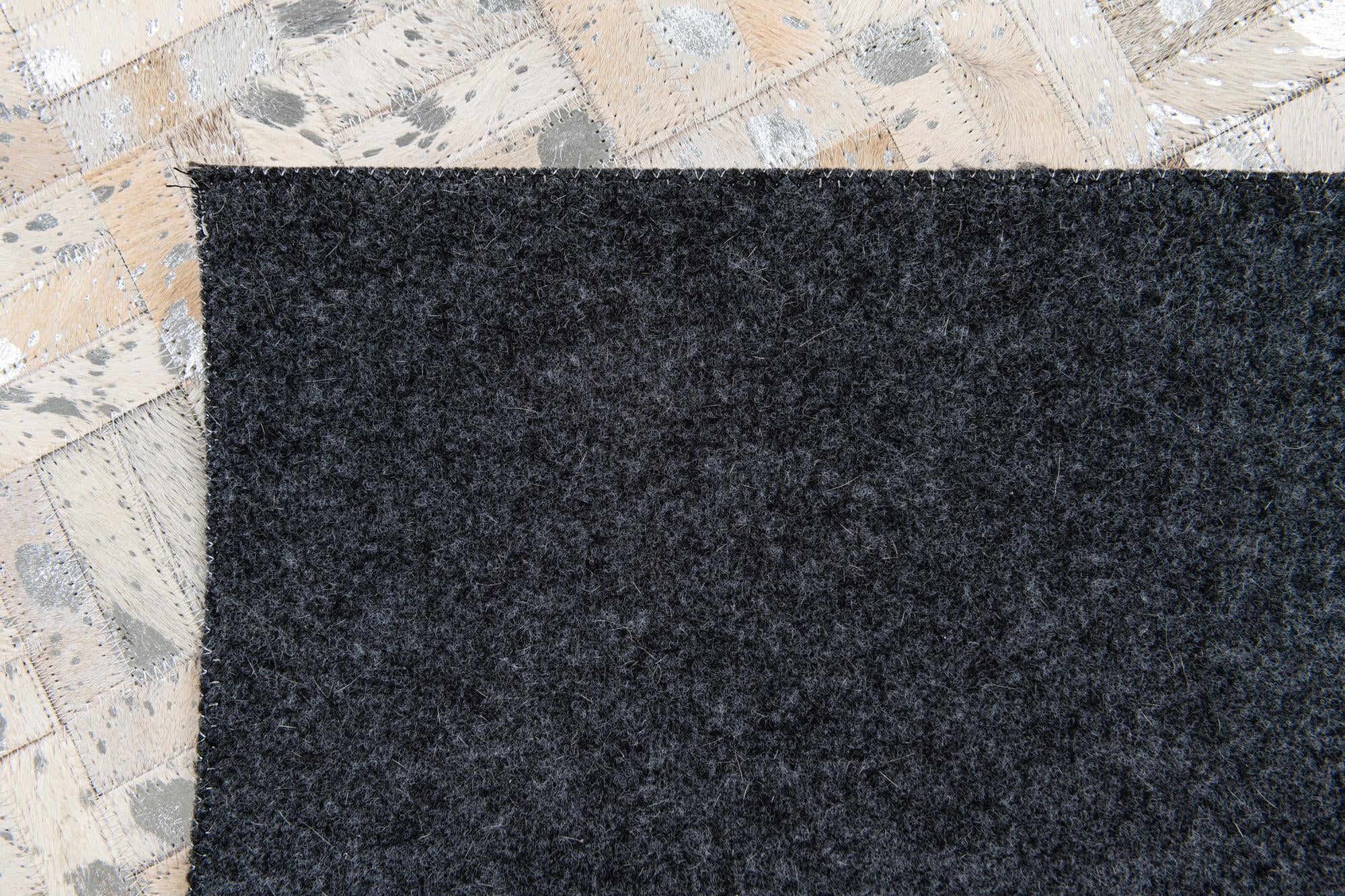 4' 11 x 8' 1 Cowhide Stocks Rug