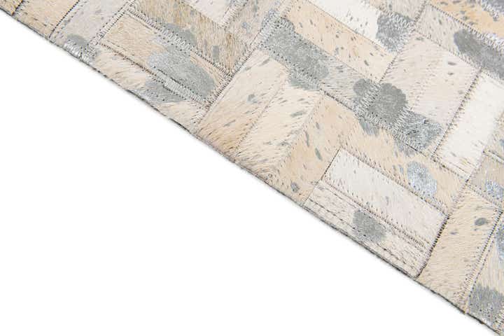 4' 11 x 8' 1 Cowhide Stocks Rug