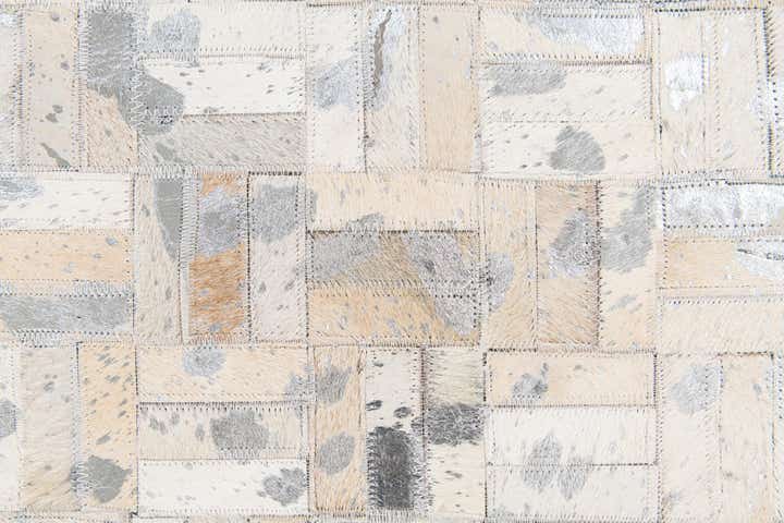 4' 11 x 8' 1 Cowhide Stocks Rug