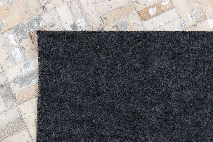 4' 11 x 8' 1 Cowhide Stocks Rug