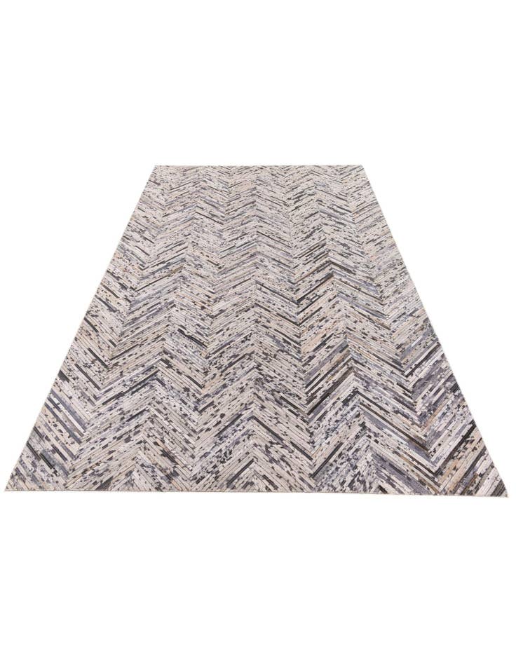 Detail image of 4' 11 x 8' 1 Cowhide Stocks Rug