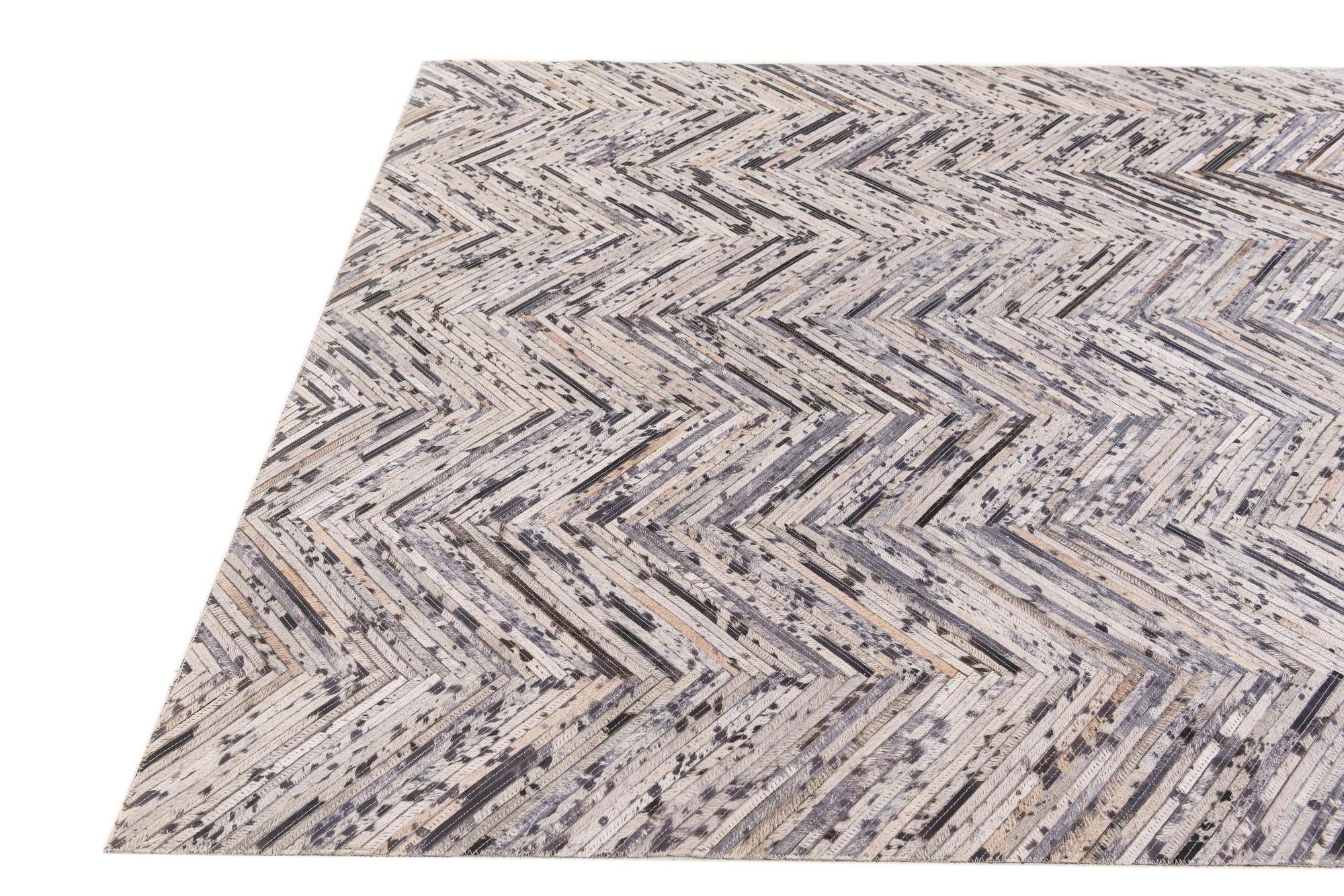 4' 11 x 8' 1 Cowhide Stocks Rug