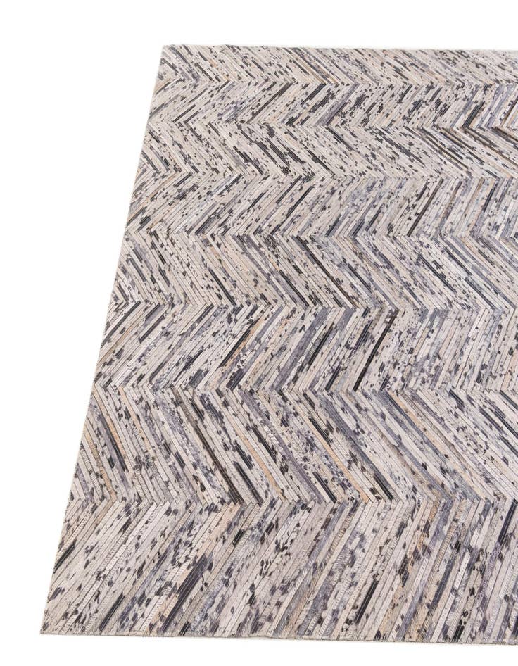 Detail image of 4' 11 x 8' 1 Cowhide Stocks Rug