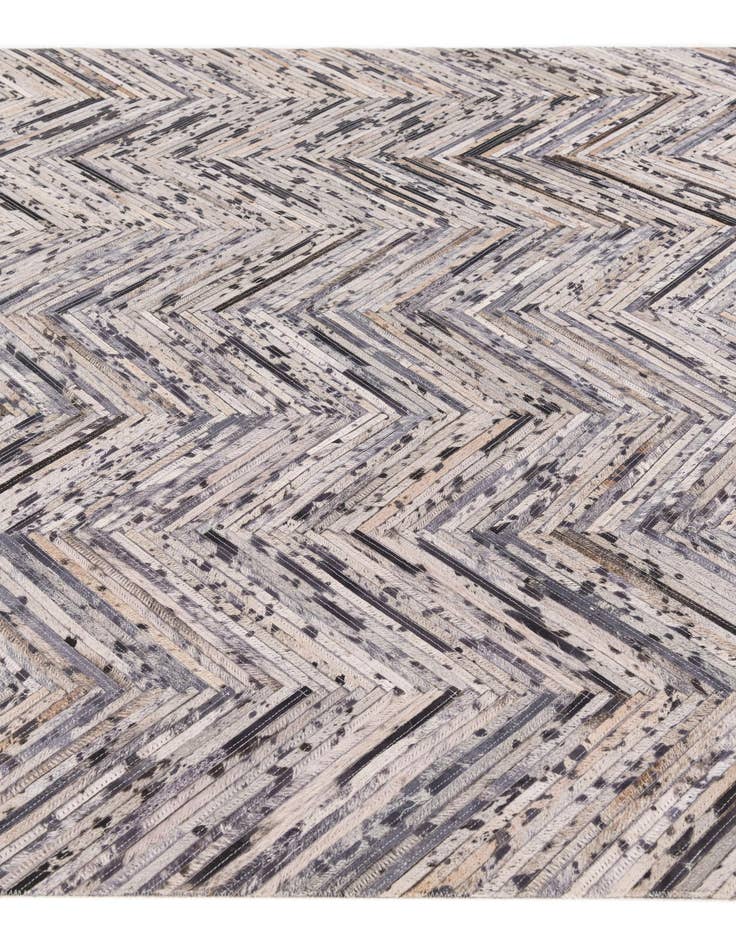 Detail image of 4' 11 x 8' 1 Cowhide Stocks Rug