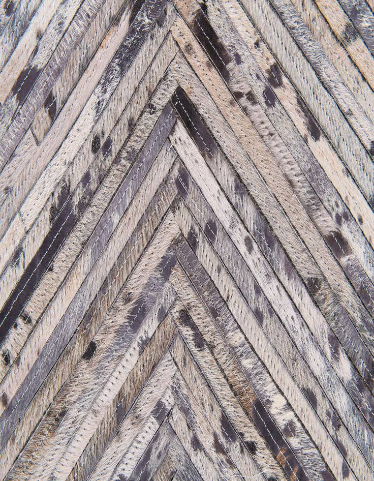 Detail image of 4' 11 x 8' 1 Cowhide Stocks Rug