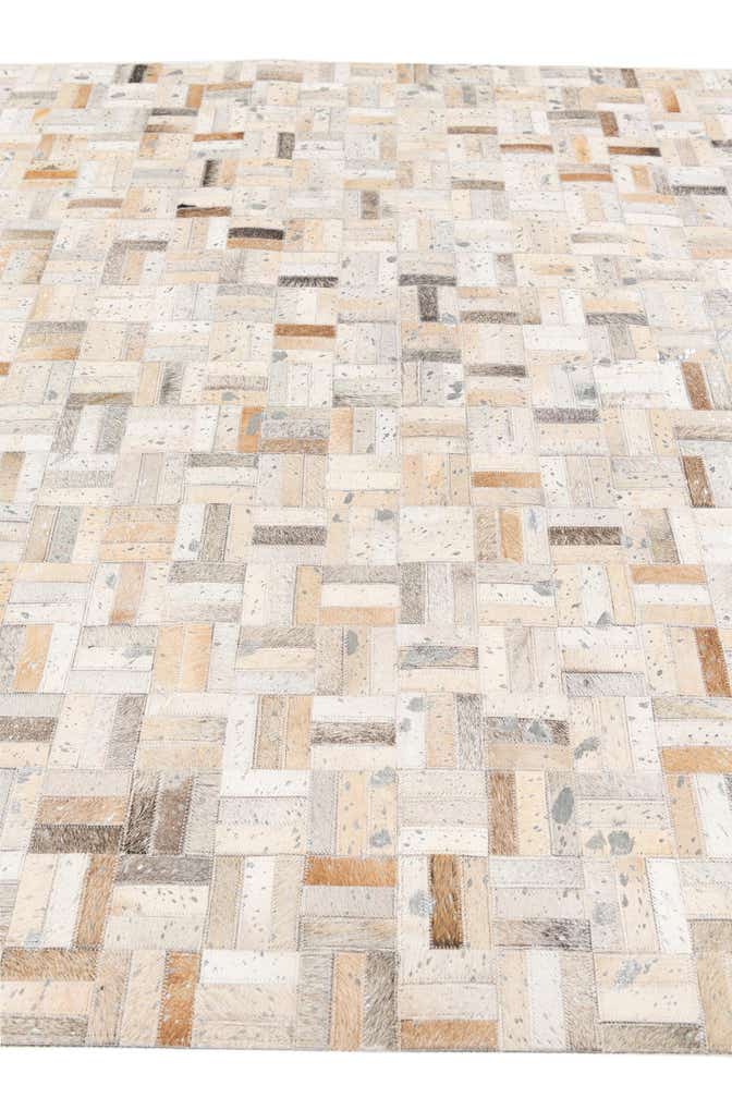 4' 11 x 8' 1 Cowhide Stocks Rug