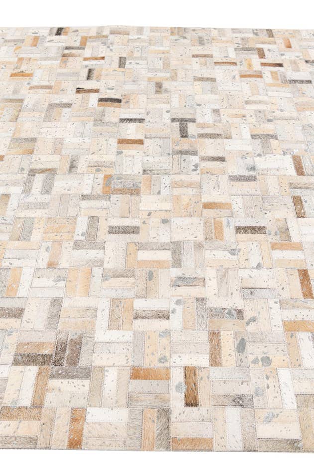 Detail image of 4' 11 x 8' 1 Cowhide Stocks Rug
