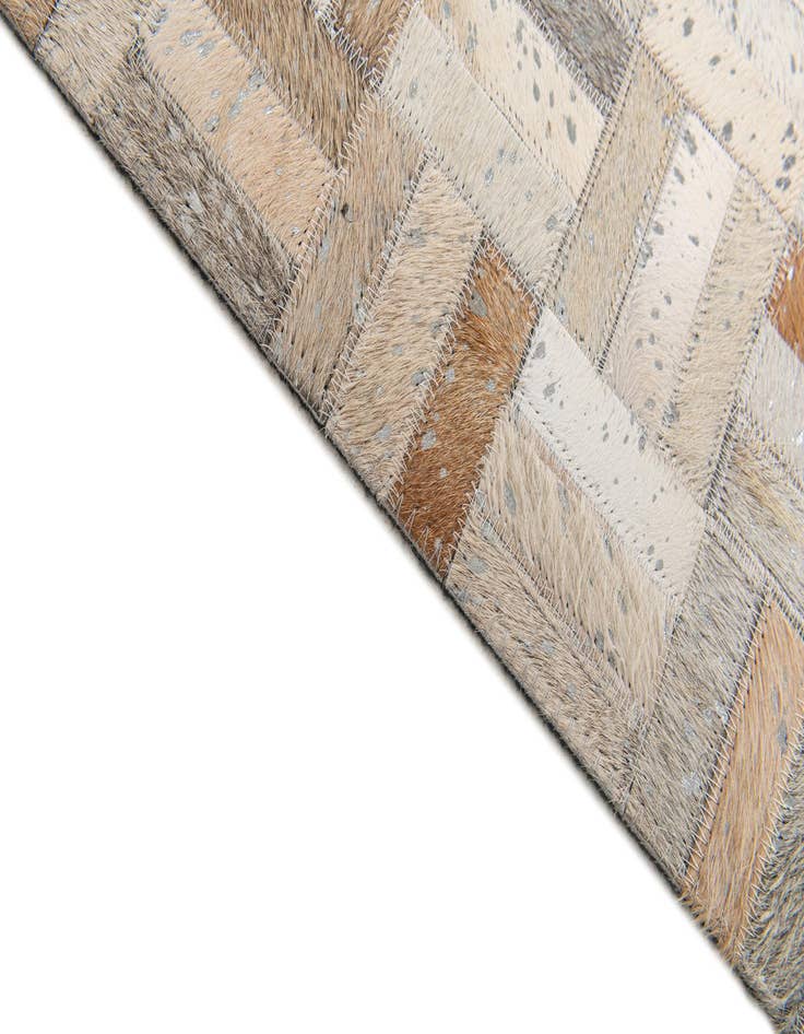 Detail image of 4' 11 x 8' 1 Cowhide Stocks Rug