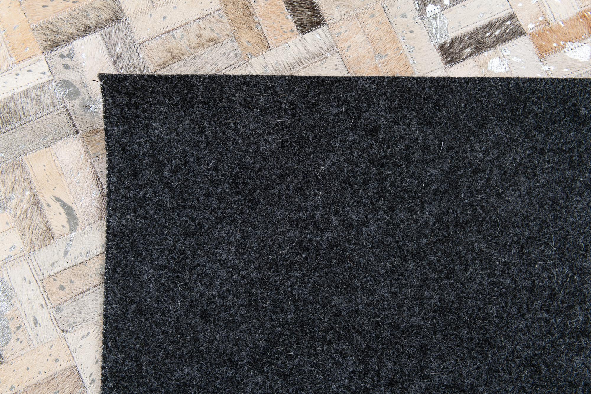 4' 11 x 8' 1 Cowhide Stocks Rug