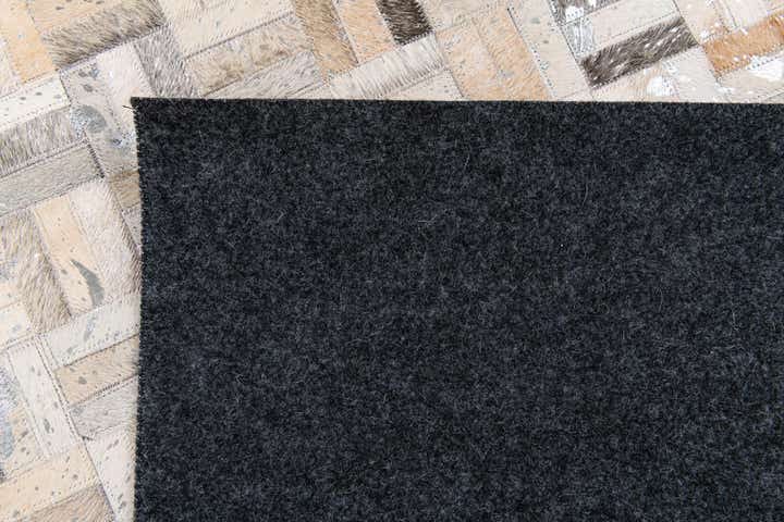 4' 11 x 8' 1 Cowhide Stocks Rug