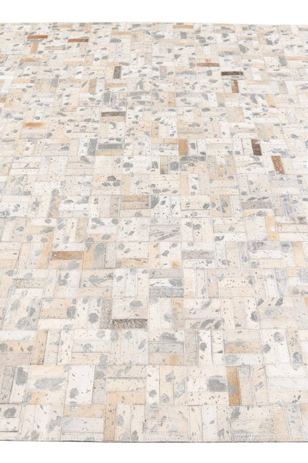 Detail image of 4' 11 x 8' 1 Cowhide Stocks Rug