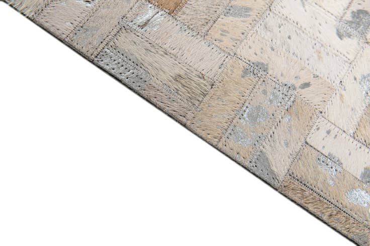 Detail image of 4' 11 x 8' 1 Cowhide Stocks Rug
