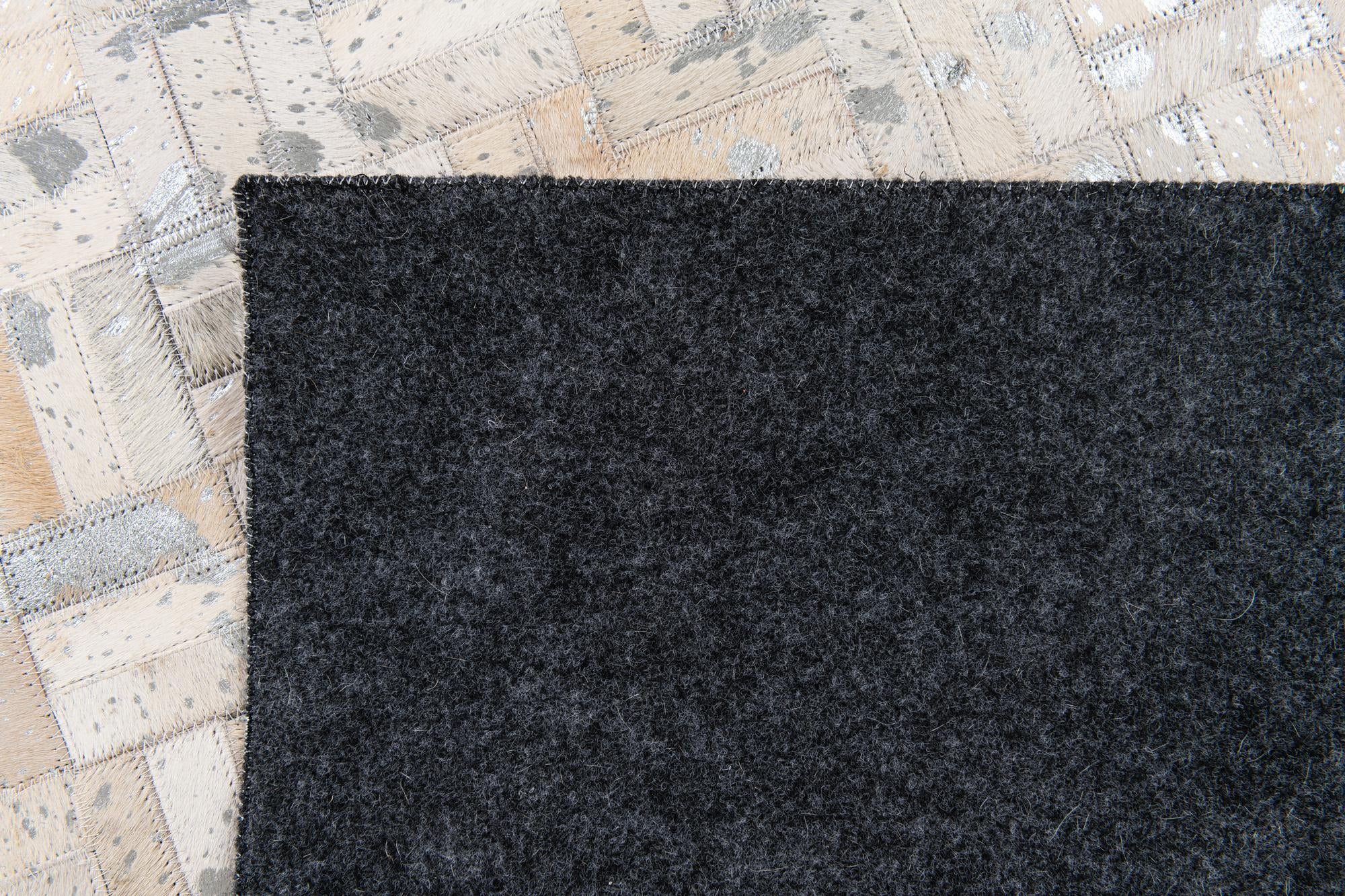 4' 11 x 8' 1 Cowhide Stocks Rug