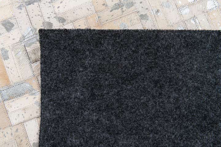 4' 11 x 8' 1 Cowhide Stocks Rug